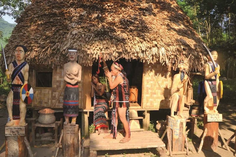 Listening to Tribal Elders Under the Communal Stilt Roof