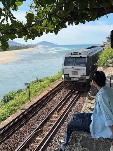 Coastal Railway Train Passing Nam O Beach